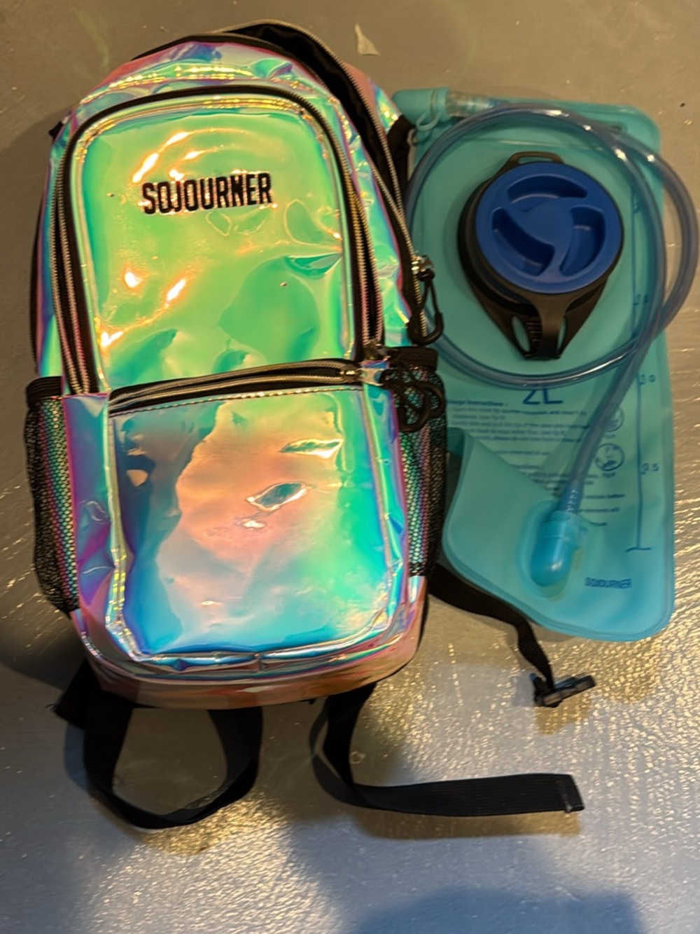 Sojourner Iridescent Holographic water Backpack - Seafoam Green